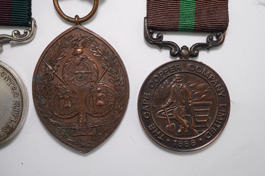 Four assorted medals; Royal East Kent Mounted Rifles Best Turned Out Troop 1901-1902-1903 Trooper Harrison; Medal for the Defence of Ookiep (reproduction); Honorable Artillery Company of London's Old Gunners Club medal t